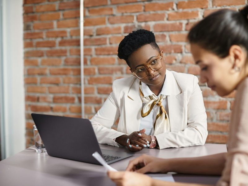 Black businesswoman having a meeting with a candidate during job interview in the office.